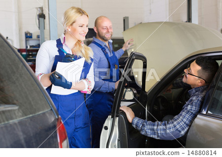 Smiling service crew and driver Smiling service crew and driver 14880814