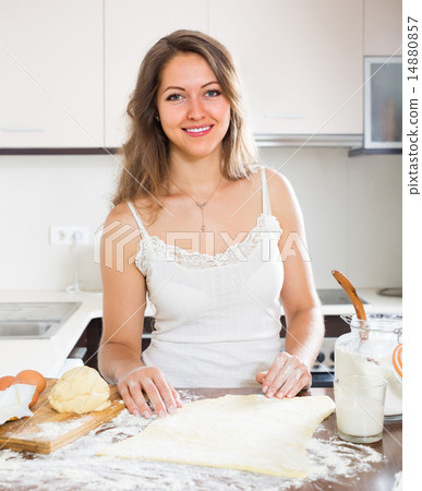 Housewife cooking at home kitchen Housewife cooking at home kitchen 14880857