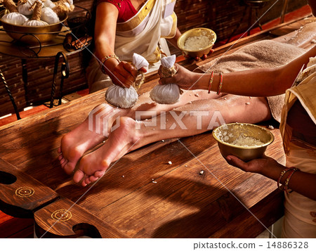 Woman having Ayurvedic feet spa massage. 14886328