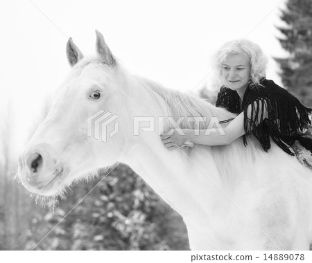 White horse and woman 14889078