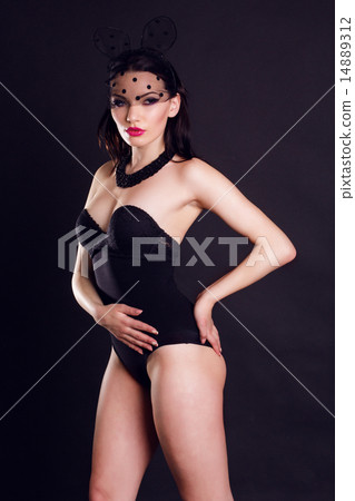 Sexy young pretty lady and bunny ears mask and black body 14889312