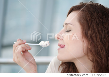 Young happy woman with cake Young happy woman with cake 14895405