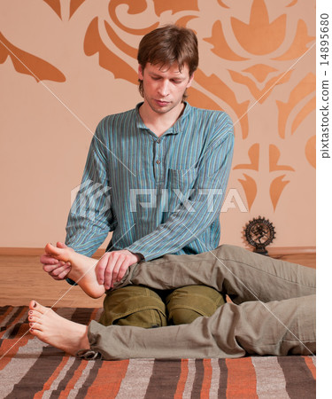 Couple doing yoga. Massage Couple doing yoga. Massage 14895680
