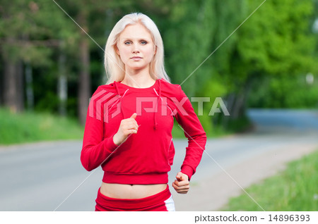 Beautiful woman running in park 14896393