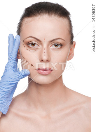Correction lines on woman face, before surgery operetion Correction lines on woman face, before surgery operetion 14896397