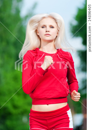 Beautiful woman running in park 14896405