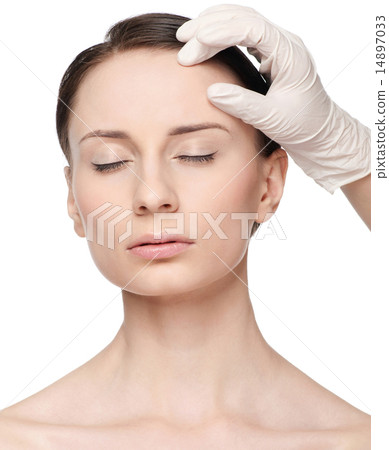 Beautician touch and exam health woman face. Beautician touch and exam health woman face. 14897033