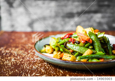 Baked vegetables on rustic background Baked vegetables on rustic background 14903003