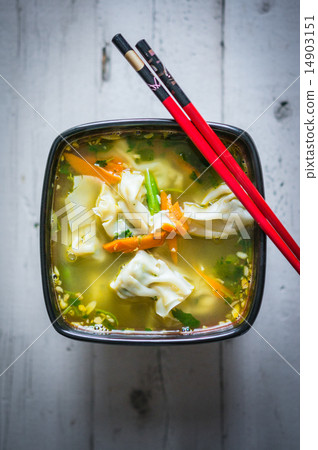Wonton soup on wooden background 14903151