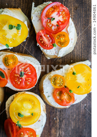 Bruschetta sandwiches on wooden background Bruschetta sandwiches on wooden background 14904861