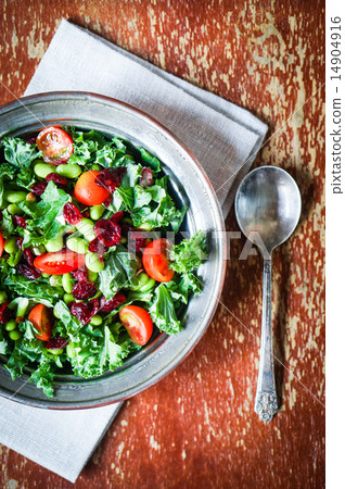 Kale and edamame salad on rustic background 14904916