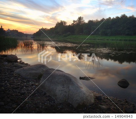 bank of the river in the city sunset 14904943