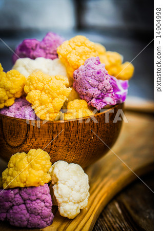 Colorful cauliflower on rustic background Colorful cauliflower on rustic background 14904998