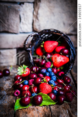 Berries mix on rustic background Berries mix on rustic background 14905917