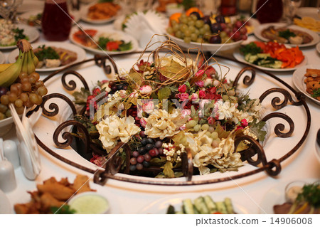 fruit and flowers on the table, vegetarian holiday table setting 14906008