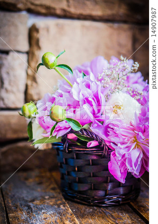 Peonies on rustic wooden background Peonies on rustic wooden background 14907987