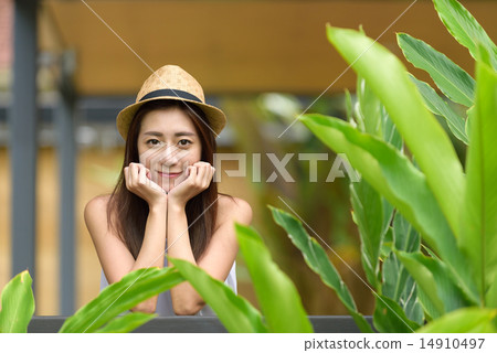 Woman putting hands on both side of her face 14910497