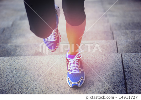 sports woman legs running up on stone stairs sports woman legs running up on stone stairs 14911727