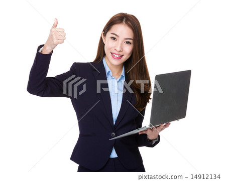 Businesswoman hold with laptop and thumb up 14912134