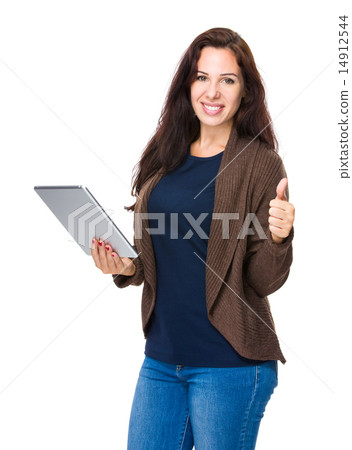 Woman with tablet and thumb up Woman with tablet and thumb up 14912544
