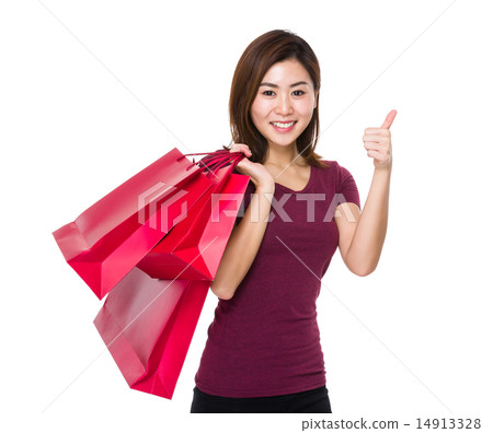 Woman hold with shopping bag and thumb up 14913328