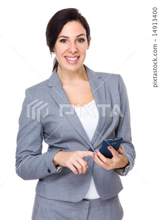 Businesswoman use of cellphone Businesswoman use of cellphone 14913400