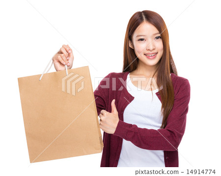 Young Woman hold with shopping bag and thumb up Young Woman hold with shopping bag and thumb up 14914774