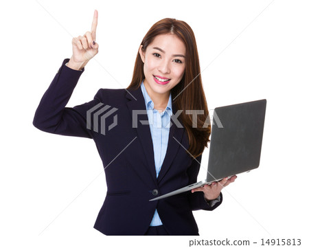 Businesswoman use of laptop and finger point up Businesswoman use of laptop and finger point up 14915813