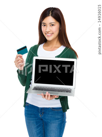 Woman show with blank screen and credit card 14916015