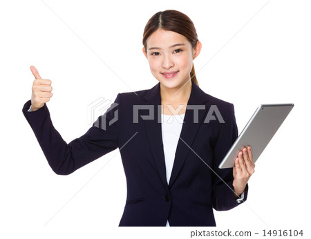 Businesswoman use of tablet and thumb up Businesswoman use of tablet and thumb up 14916104