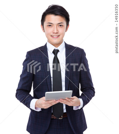 Asian business man use of digital tablet Asian business man use of digital tablet 14916350