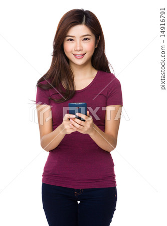 Young woman using mobile phone Young woman using mobile phone 14916791