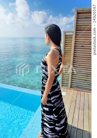 Blue sky and sea and young lady Blue sky and sea and young lady 14920597