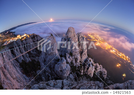 Beautiful night landscape with full moon, sea, rocks and clouds Beautiful night landscape with full moon, sea, rocks and clouds 14921563