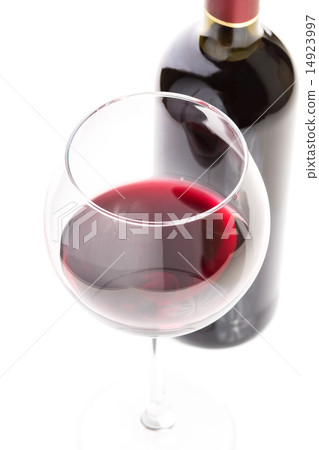 Wineglass with red wine and bottle Wineglass with red wine and bottle 14923997