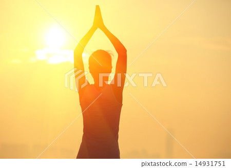 healthy yoga woman meditation at sunrise seaside 14931751