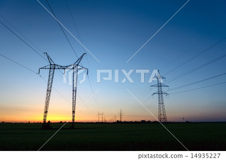 Large transmission towers at blue hour Large transmission towers at blue hour 14935227