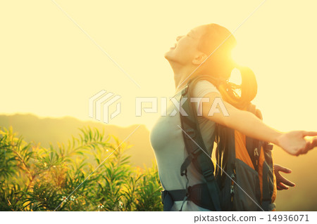 thankful woman hiker open arms to the sunrise thankful woman hiker open arms to the sunrise 14936071