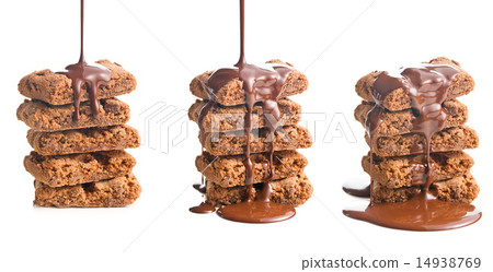 pouring chocolate on brownies pouring chocolate on brownies 14938769