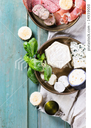 Plates of cheese and sausage Plates of cheese and sausage 14939008