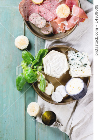 Plates of cheese and sausage 14939009