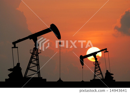 Oil rig oil pump on sunset 14943641