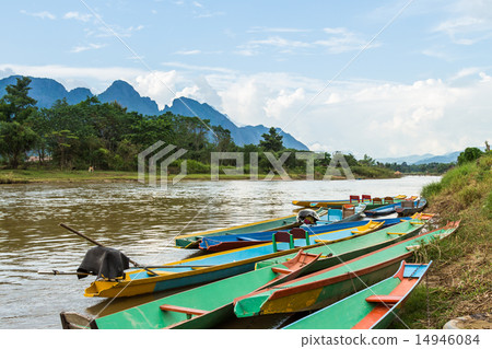 boats in Nam Song river at Vang Vieng, Laos boats in Nam Song river at Vang Vieng, Laos 14946084