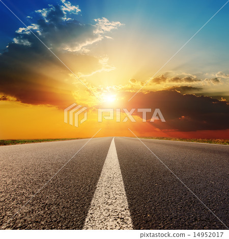 asphalt road under sunset with clouds asphalt road under sunset with clouds 14952017