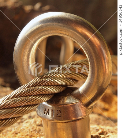 Ferrata, iron rope in anchor eye concreted in rock Ferrata, iron rope in anchor eye concreted in rock 14956542