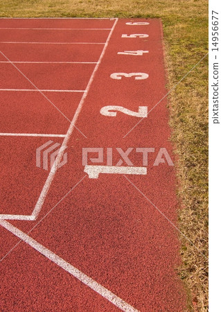 White track number on red rubber racetrack stadium White track number on red rubber racetrack stadium 14956677