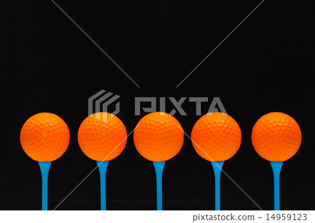Golf balls on blue wooden tees 14959123