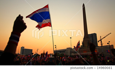 Thai flag and hands at Victory monument Thai flag and hands at Victory monument 14960081
