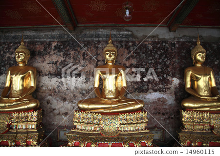 Golden Buddha statues at corridor in Wat Suthat Golden Buddha statues at corridor in Wat Suthat 14960115