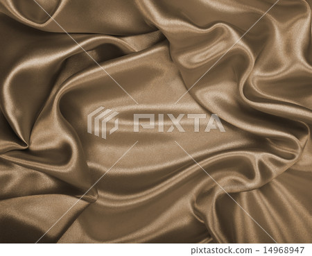 Smooth elegant golden silk or satin as background. 14968947